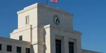 Fed Rate Decision March 2025: Impact on Your Savings Federal Reserve building facade with clock tower, representing economic policy